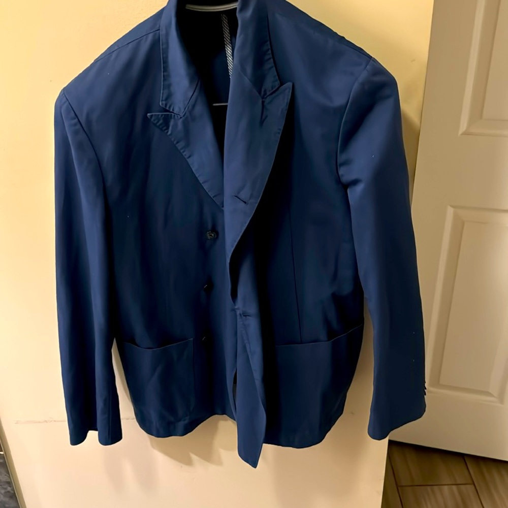 Dress jacket. Don’t need no more. Has pocket on the inside for valuables.